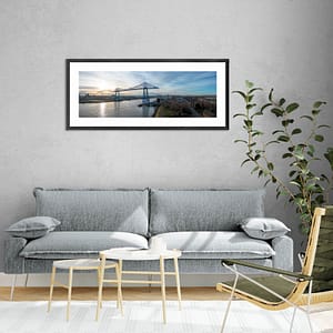 Tees Transporter Bridge at Sunset by Alchemi Art framed on wall in room