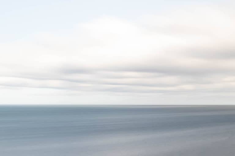 Long Exposure of clouds over the North Sea by Mara Louvain Robinson of Alchemi Art
