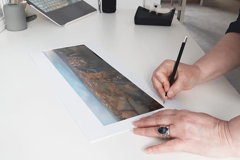Signing a Mounted Print